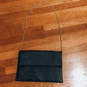 Black studded clutch